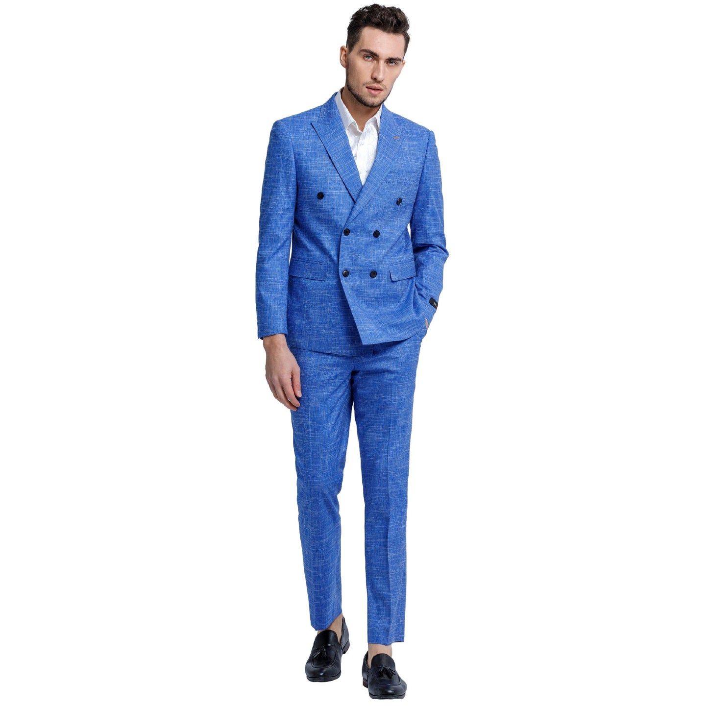 Model wearing KCT Menswear Ocean Blue Textured Double-Breasted Suit, highlighting the unique fabric and sophisticated design