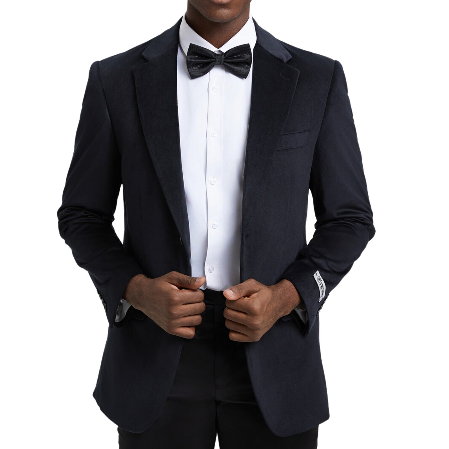 Elegant man in a classic black velvet blazer for formal events.