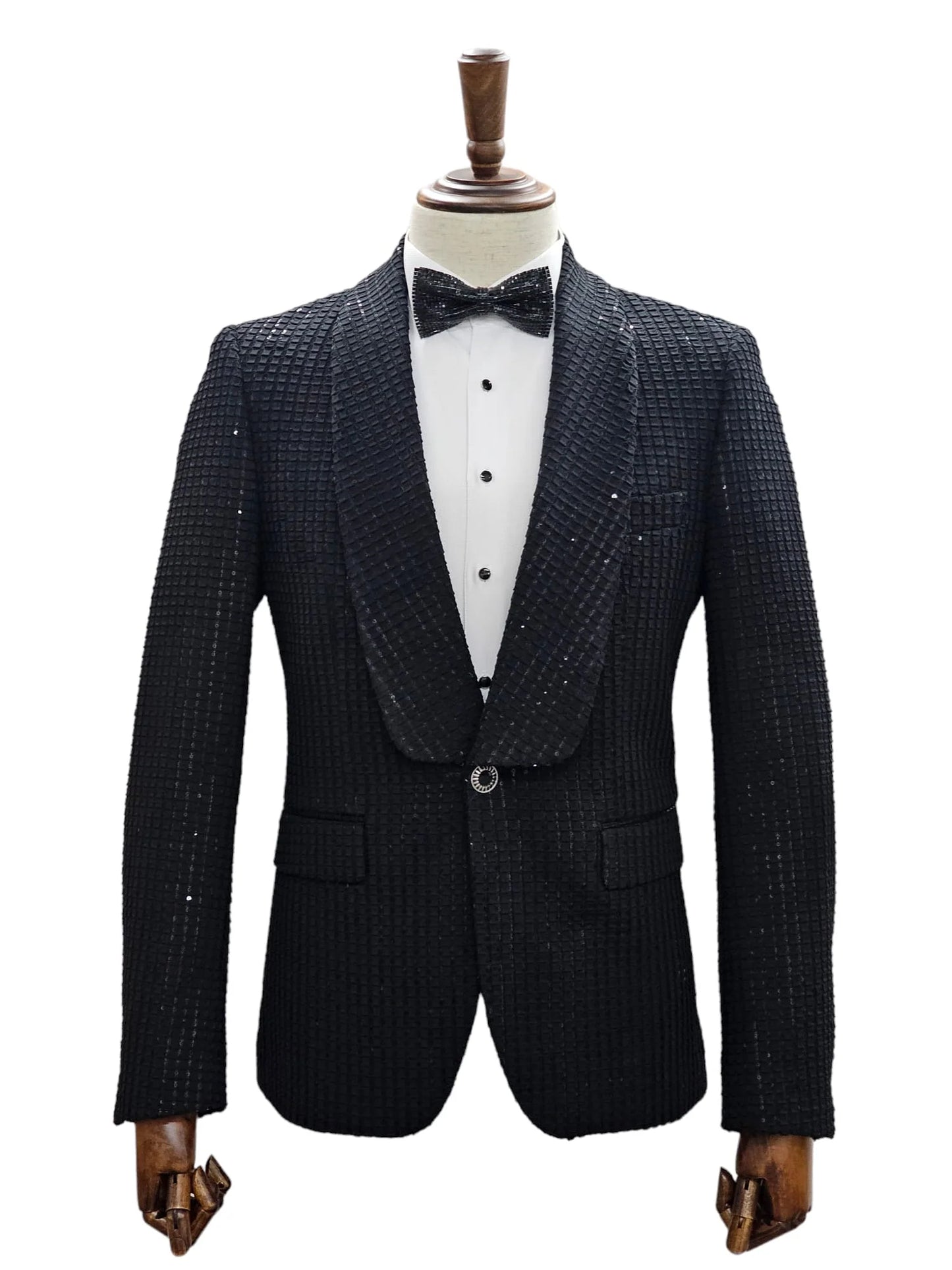 Mannequin dressed in KCT Menswear's sparkling black sequin tuxedo suit for prom and wedding events.