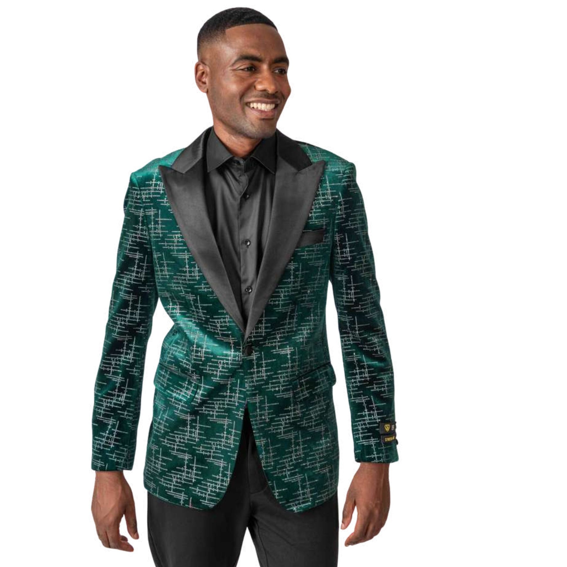 Men’s Green Patterned Velvet Tuxedo Blazer for Prom 2025, featuring a luxurious emerald green velvet fabric with a sleek geometric pattern and a black satin peak lapel.