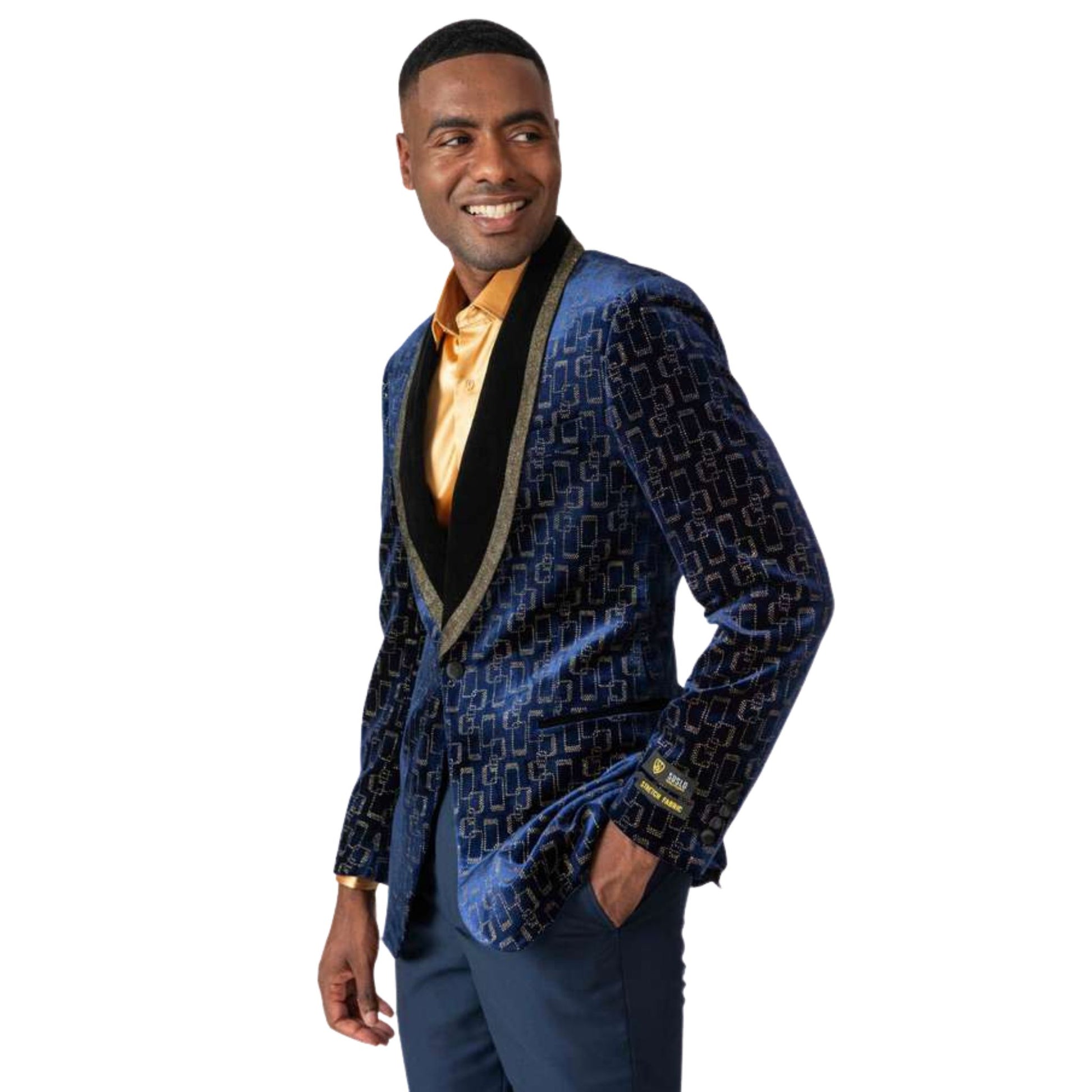 Men’s Royal Blue Velvet Tuxedo Blazer for Prom 2025, featuring a deep blue velvet fabric with a gold geometric pattern and a black satin shawl lapel with gold trim.