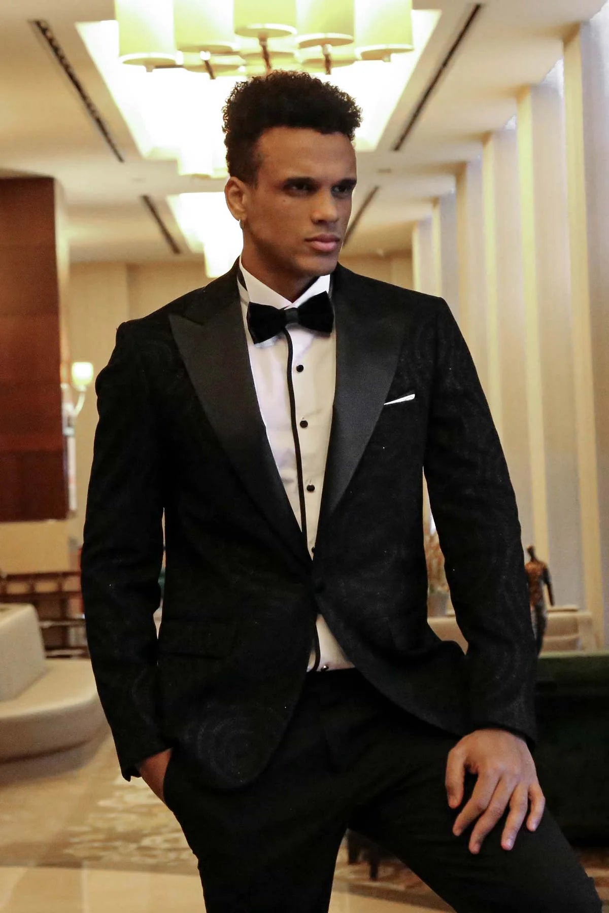 Hypnose Pattern Peak Lapel Slim Fit Black Men Prom Blazer, perfect for proms and other formal events, available exclusively at KCT Menswear.